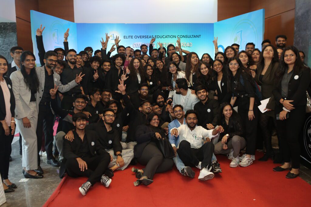 Group photo of Elite Overseas Education Consultant team and students at a study abroad event
